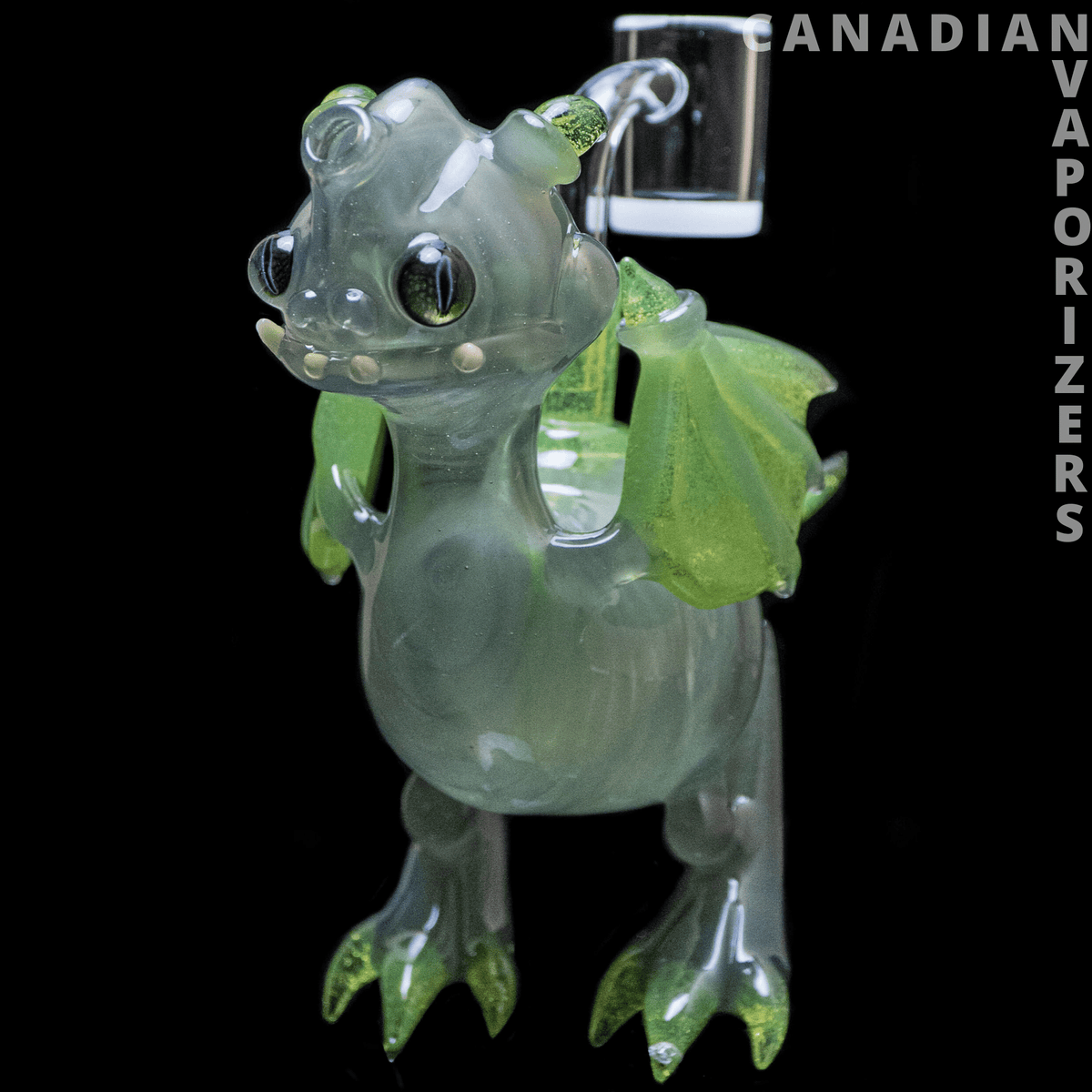 Dragon By Friday Glass - Translucent green glass dragon water pipe with bulging eyes, leafy wings, and clawed feet.