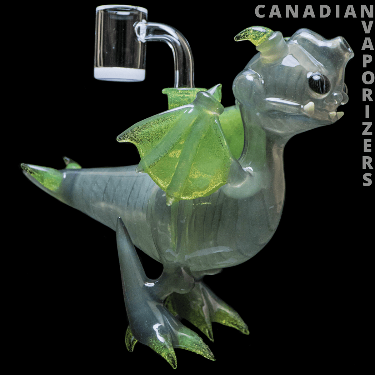 Dragon By Friday Glass - Translucent gray dragon-shaped glass water pipe with bright green wings and a clear curved mouthpiece.