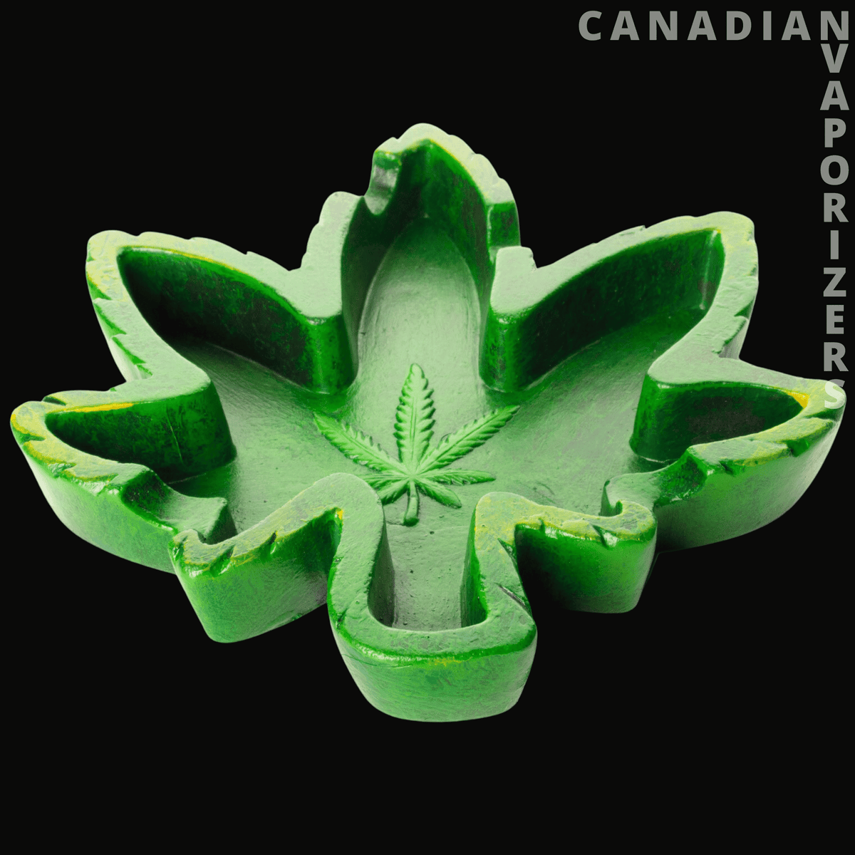 Leaf Ashtray - Bright green leaf-shaped ashtray with raised cannabis leaf detailing and deep notched edges.