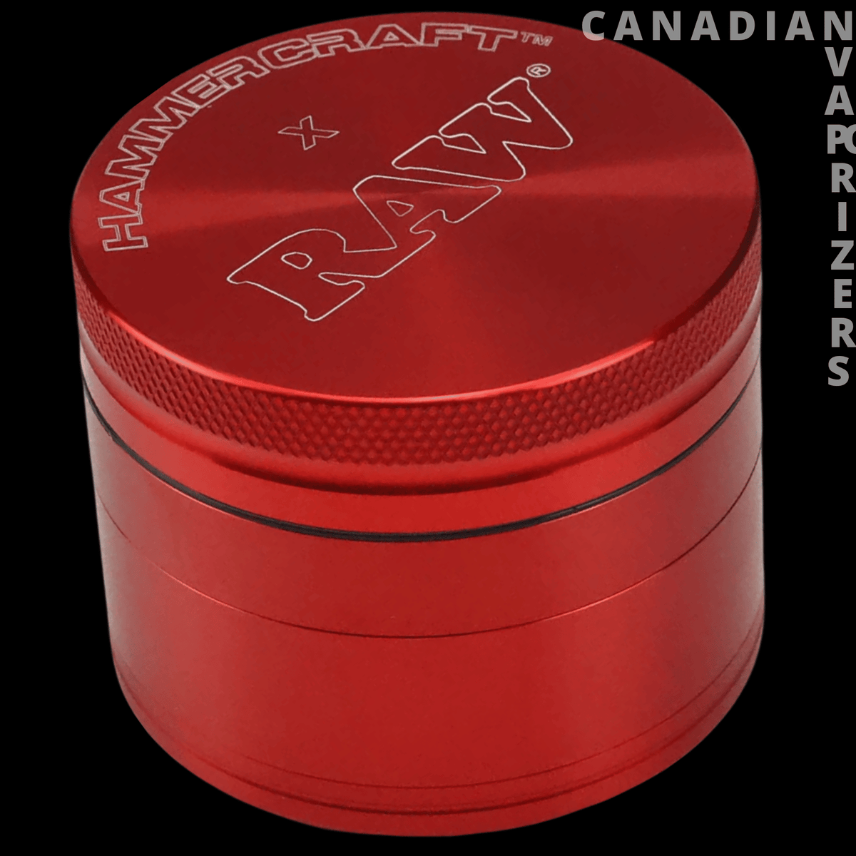 Raw Aluminum Grinder - Red cylindrical aluminum grinder with knurled sides and engraved RAW branding on the lid.