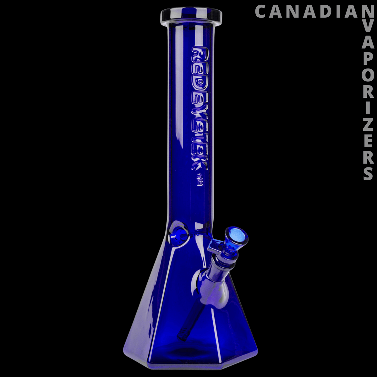 Red Eye Tek 15" Hextatic Tube - Blue 15-inch glass water pipe with a hexagonal base, angled side chamber, and Red Eye Tek branding.