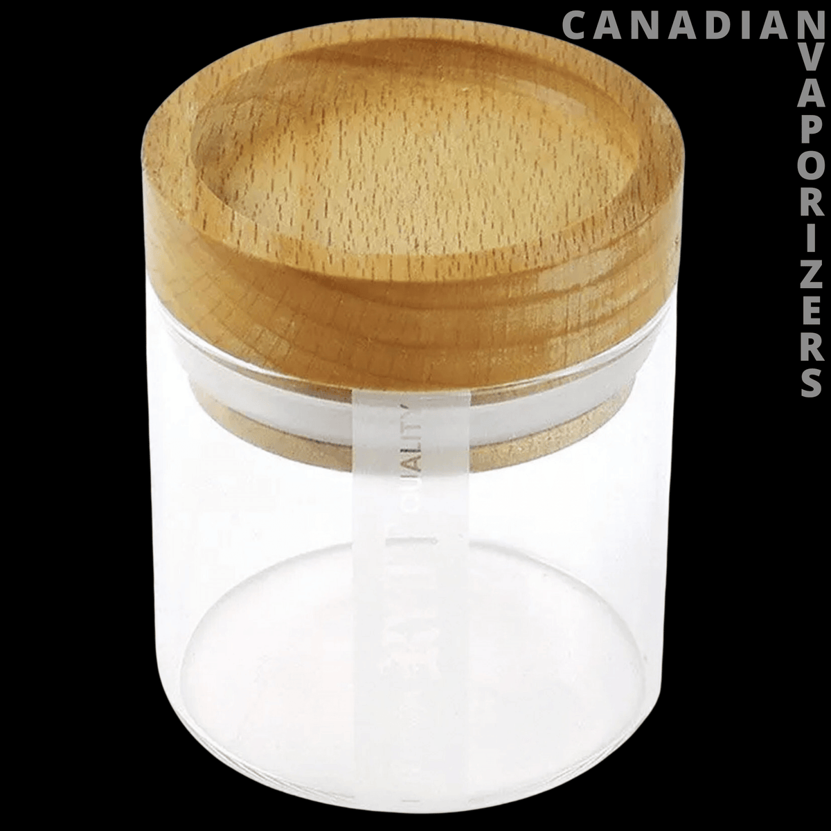 Ryot Jar - Clear cylindrical storage jar with a natural wood-grain lid and a vertical measuring scale.