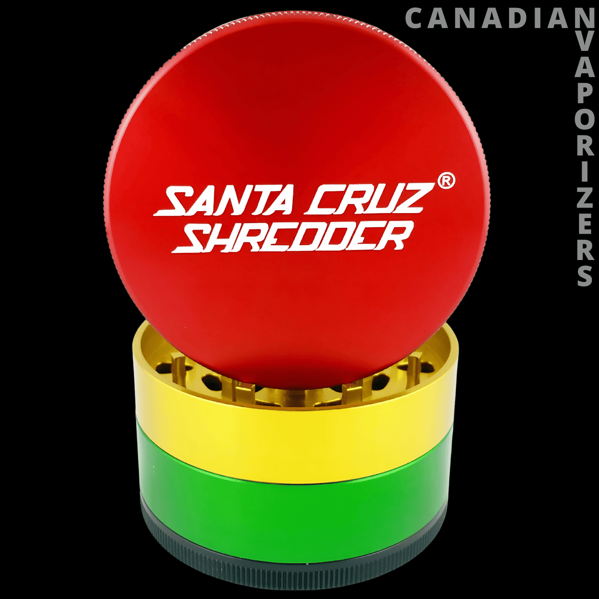 Santa cruz shredder large 4-piece pollinator 2.75" - Red Santa Cruz Shredder lid above a yellow, green, and black four-piece grinder base.