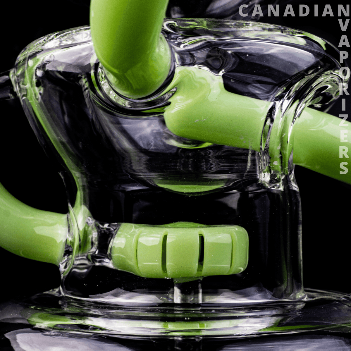 Slyme Green | Hydros Glass Kliencycler - Close-up of a clear glass Kliencycler with bright slyme-green tubing and a matching slotted percolator.
