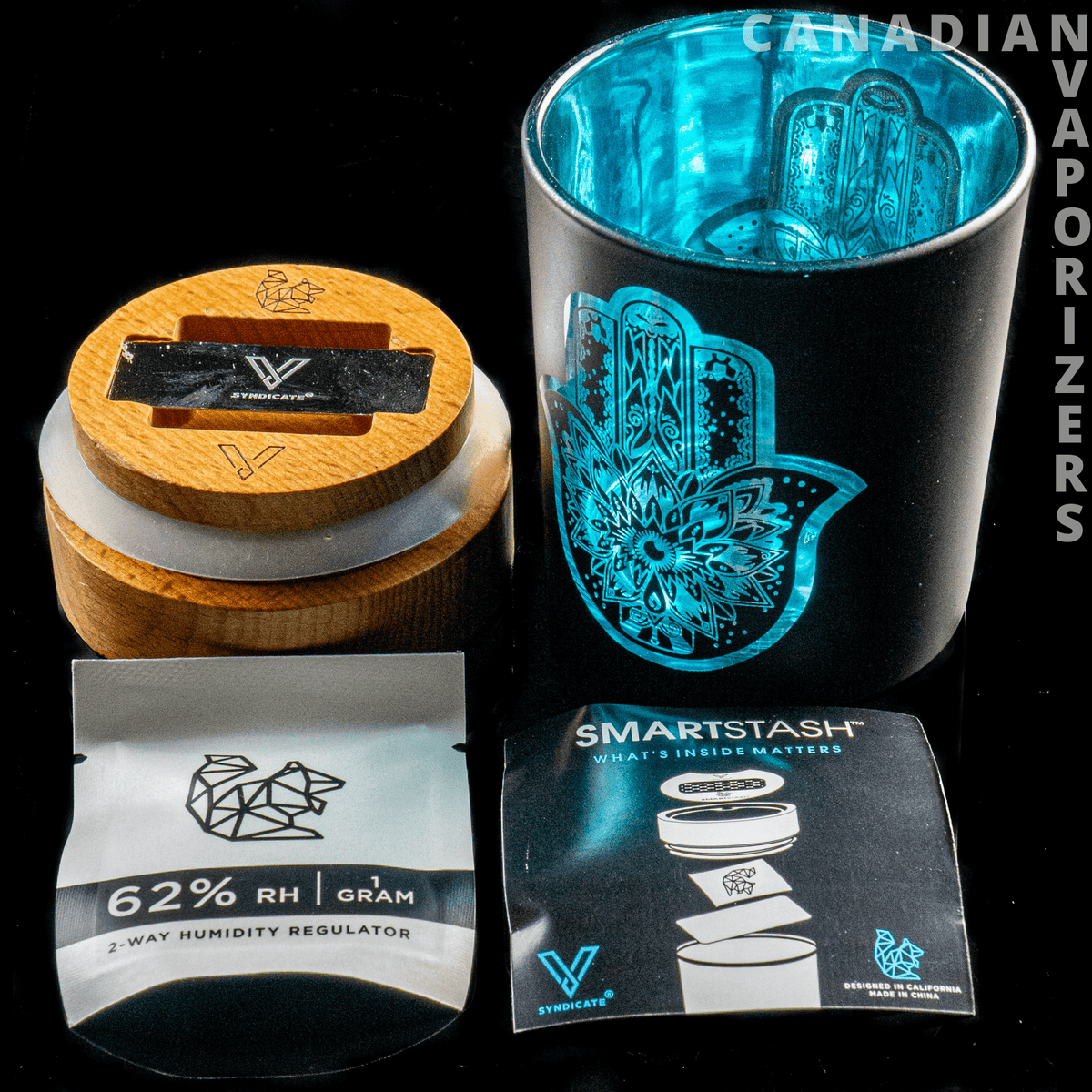 V-Syndicate Hamsa Smart Stash Jar - Grinder and Stash Jar - Black Hamsa stash jar with turquoise hand design, wooden grinder lid, and matching storage packaging.
