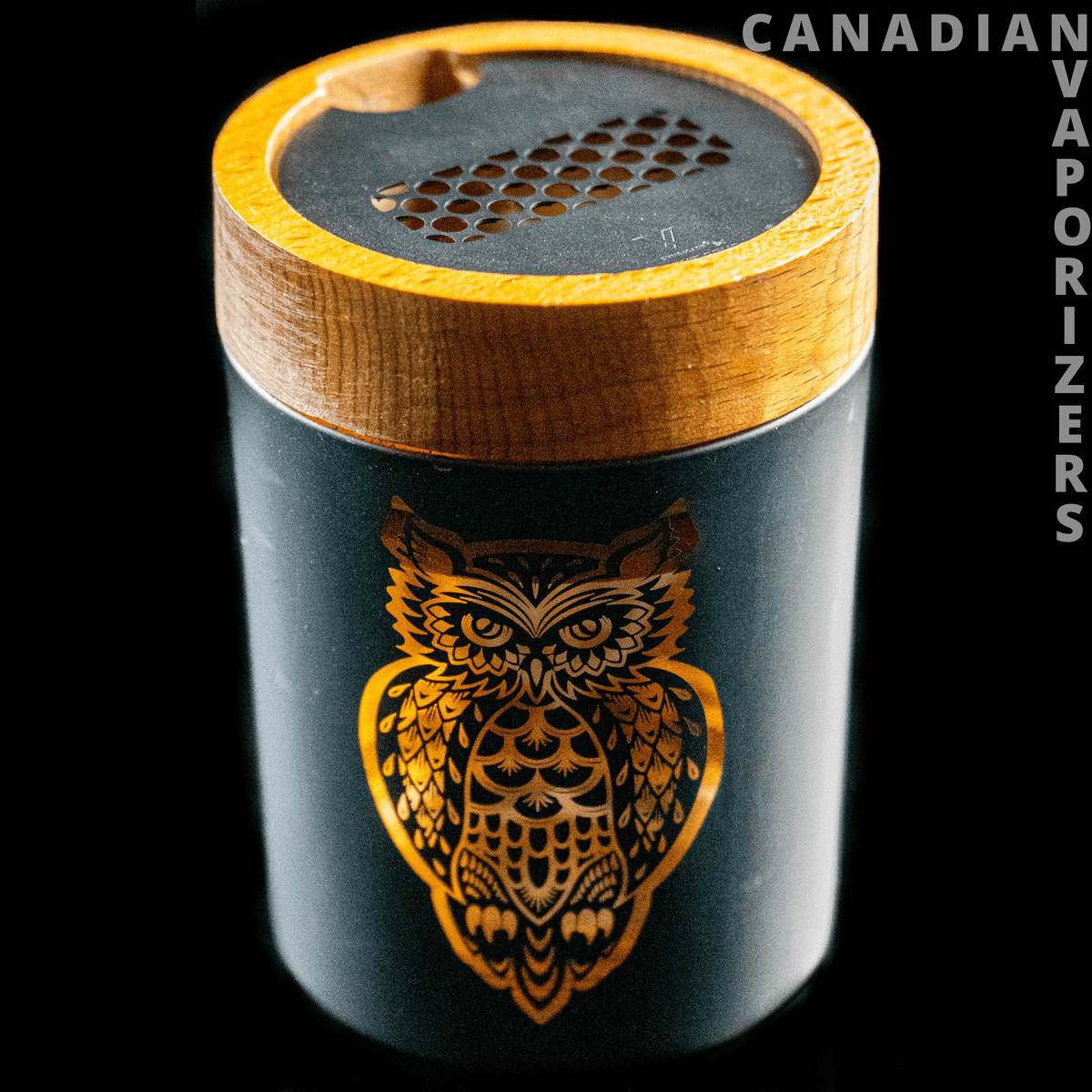 V-Syndicate Hamsa Smart Stash Jar - Grinder and Stash Jar - Black cylindrical stash jar with an orange owl design and wood-grain grinder lid with a perforated metal screen.