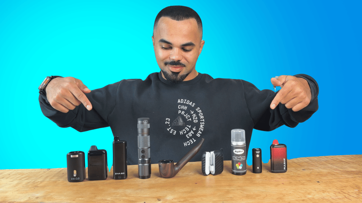 Riley sitting at table with all his best 510 thread batteries