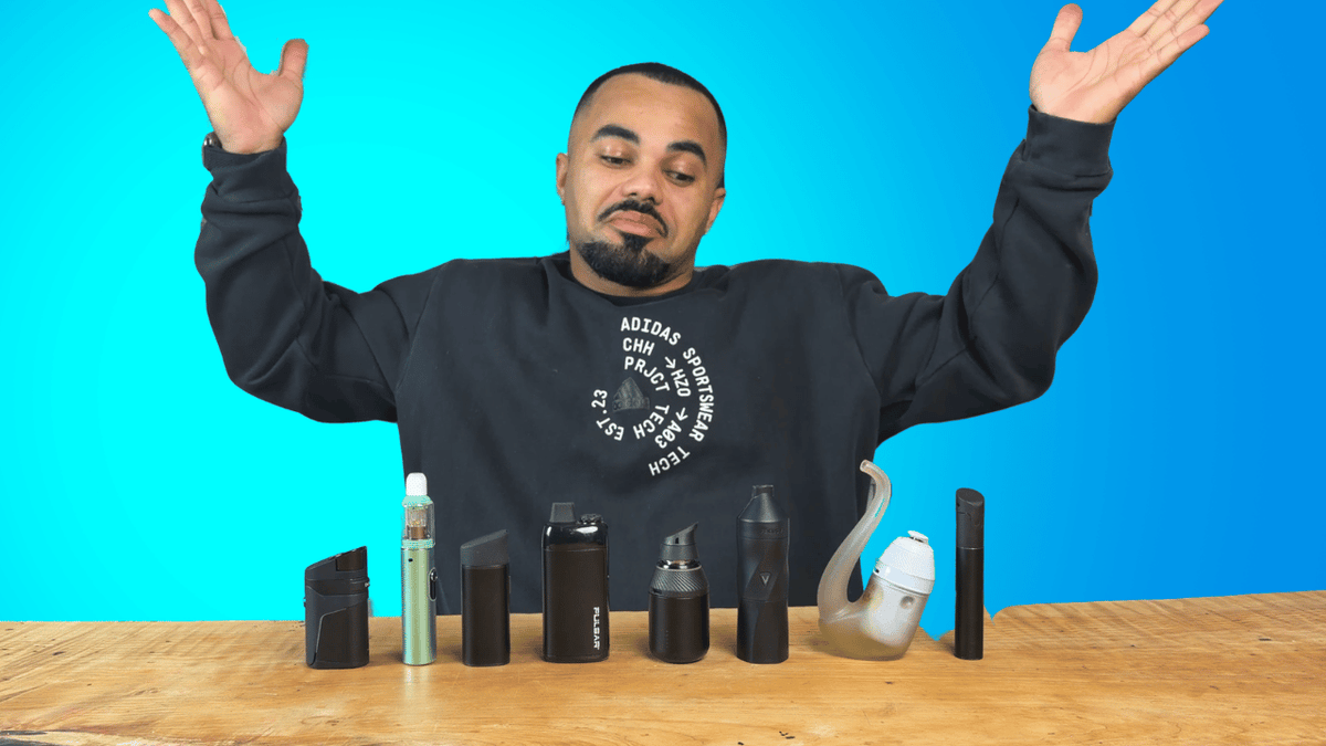 Riley sitting at table with all his best dab pens