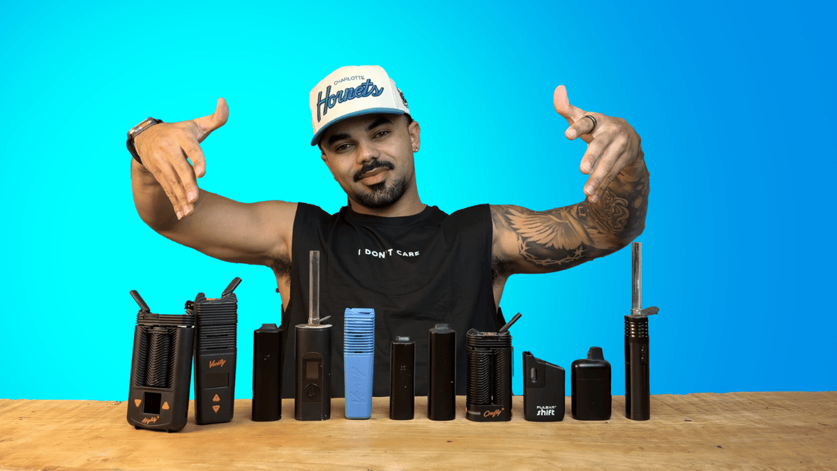 Riley sitting at table with all of his best weed vaporizers