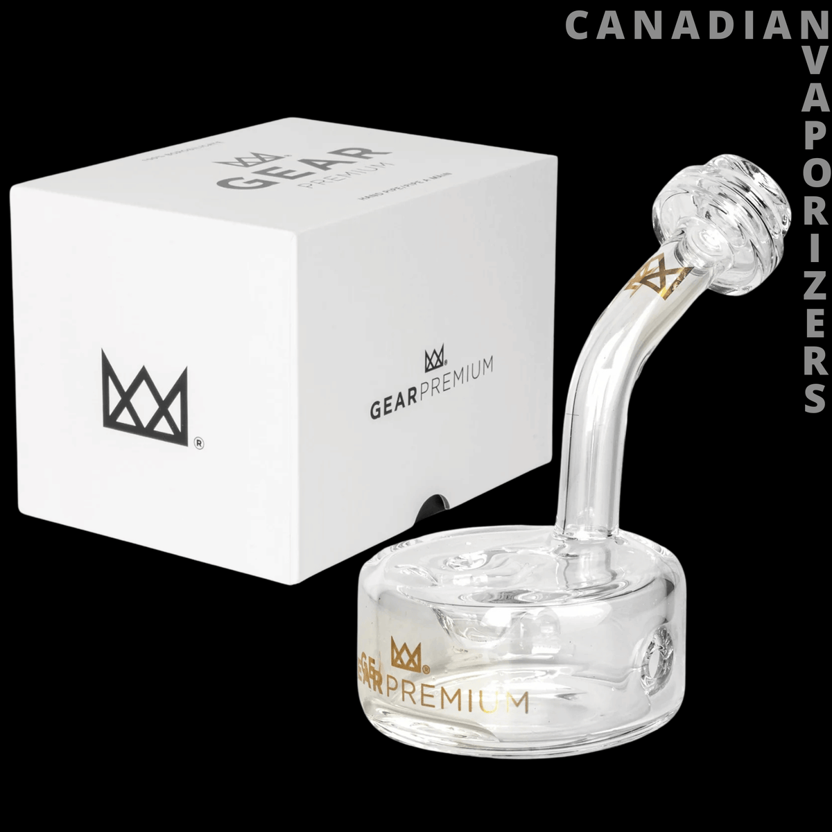 Gear Premium 4" Logan Puck Hand Pipe - Clear glass 4-inch hand pipe with curved neck, round base, and gold Premium 4 branding beside its white box.