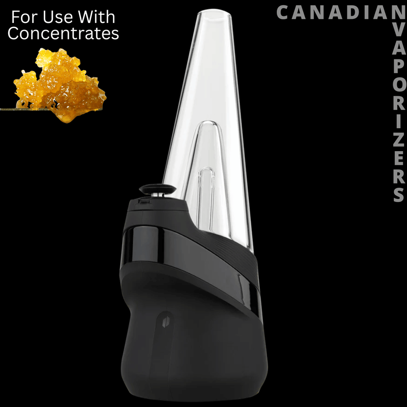 Puffco New Peak - Black Puffco New Peak vaporizer with a clear glass mouthpiece and angled base, shown with concentrate.