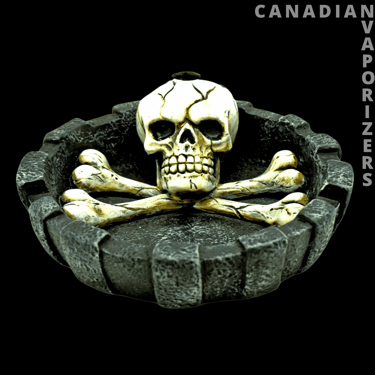 Skull &amp; Crossbones Ashtray - Dark gray stone ashtray with a raised ivory skull and crossed bones at the center.