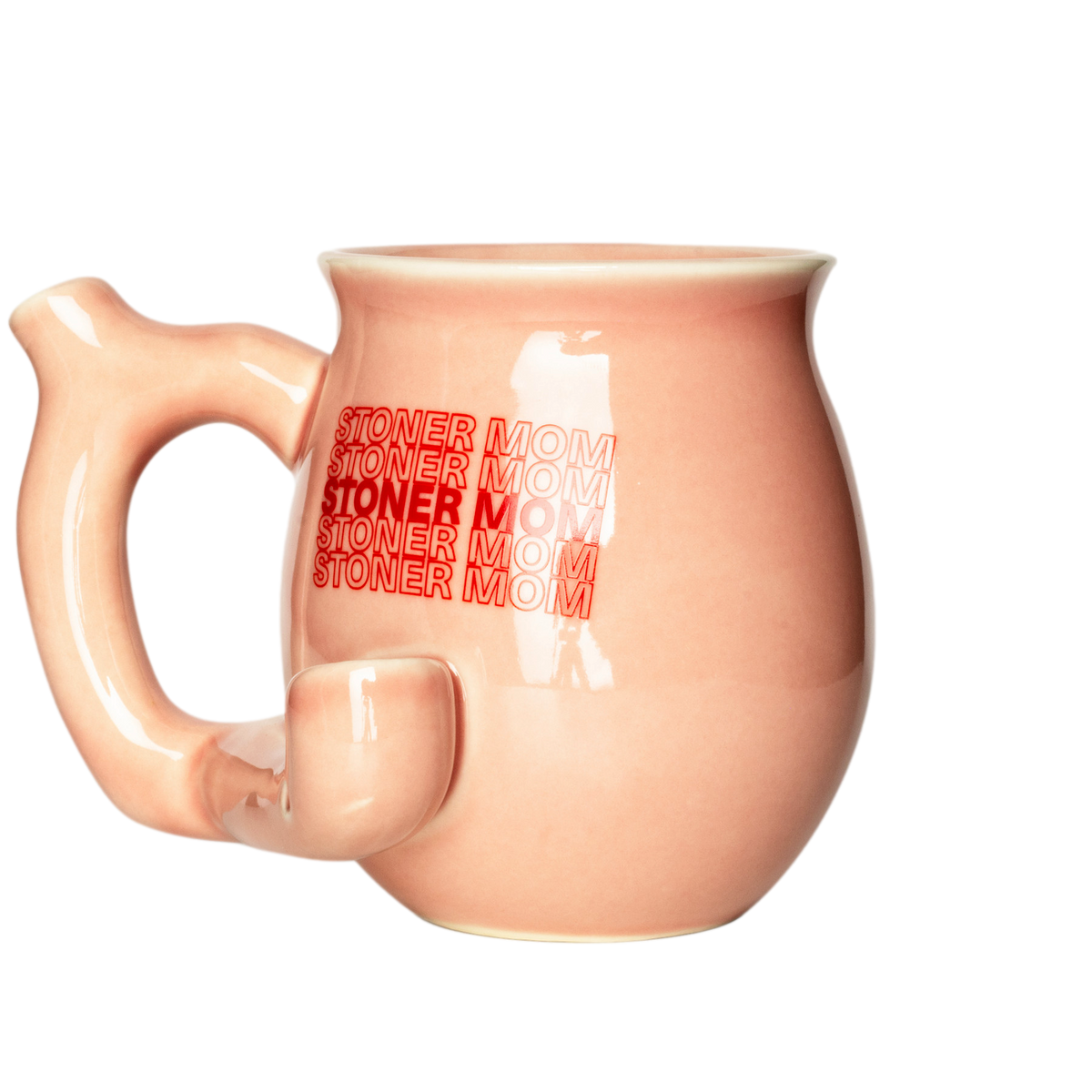 Stoner Mom Mug Pipe - Peach-colored ceramic mug pipe with a curved handle, front bowl, and red “Stoner Mom” lettering.