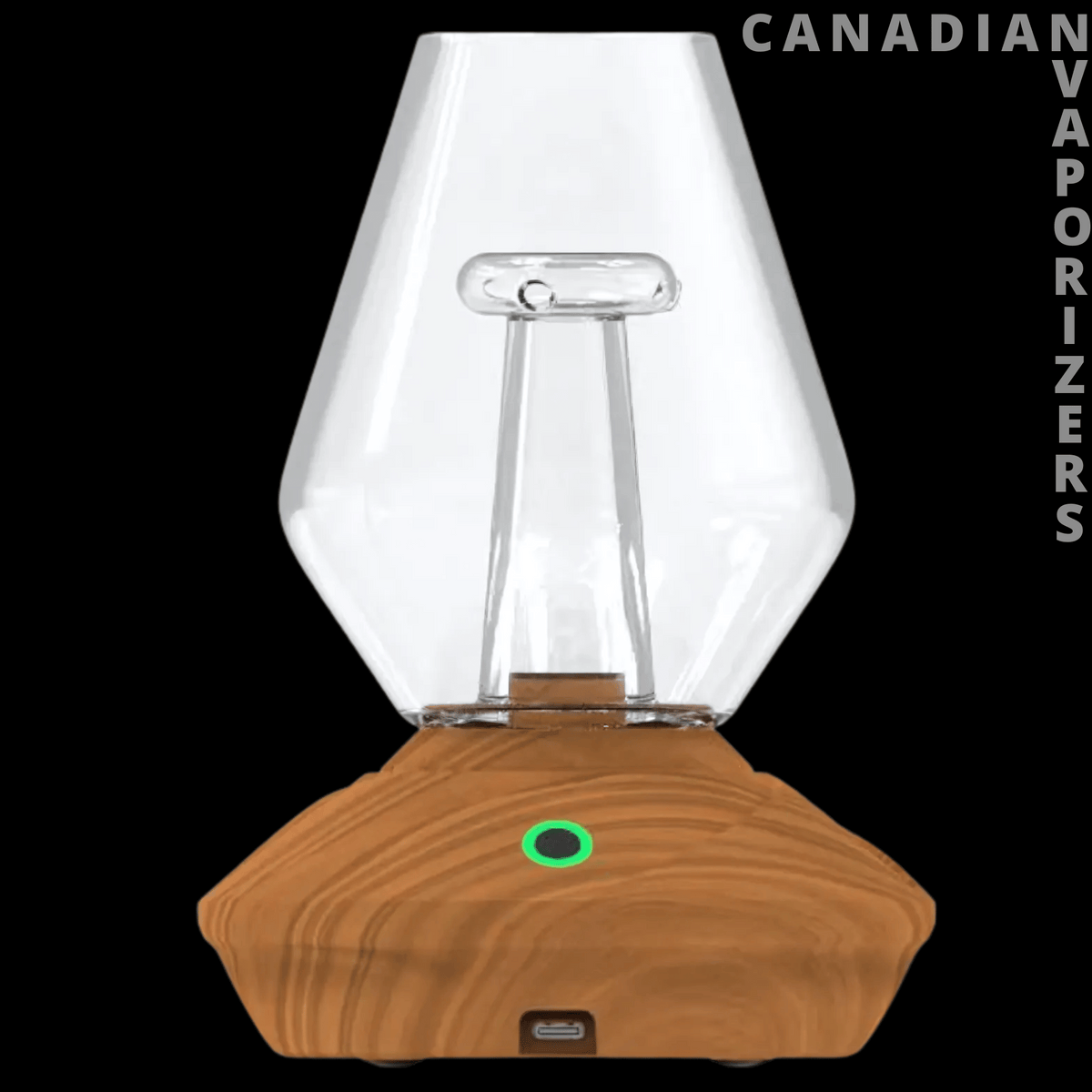Zenco Fusion - Wood-grain Zenco Fusion vaporizer with a clear faceted glass chamber and glowing green button.