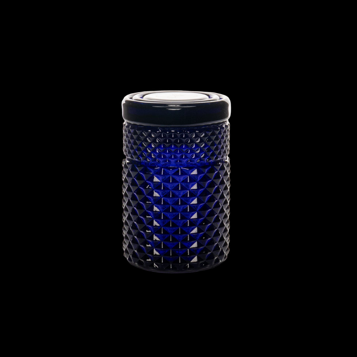 Jane West 3" Twenties Collection Stash Jar - Cobalt blue glass stash jar with a faceted diamond pattern and a dark screw-top lid.