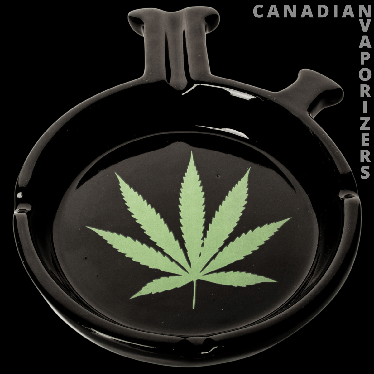 Bong Ashtray - Glossy black glass bong ashtray with a raised cannabis leaf design and molded rests.