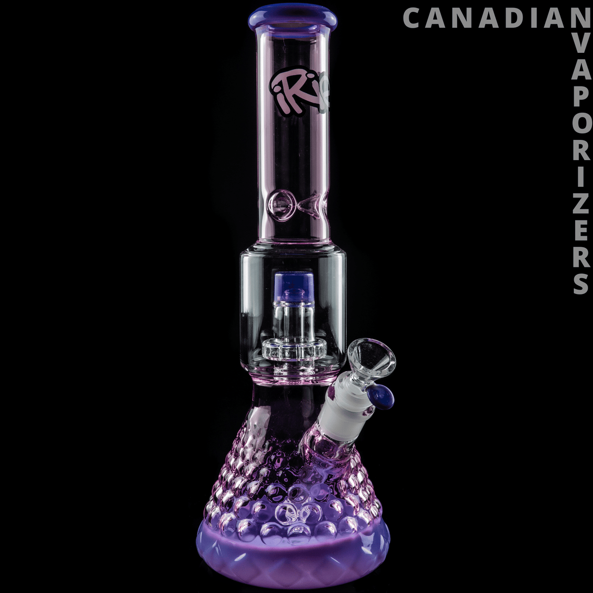 iRie | Pink 13.5" Dual Chamber Beaker Tube - Pink-purple glass beaker bong with dual chambers, textured base, and side-mounted bowl.