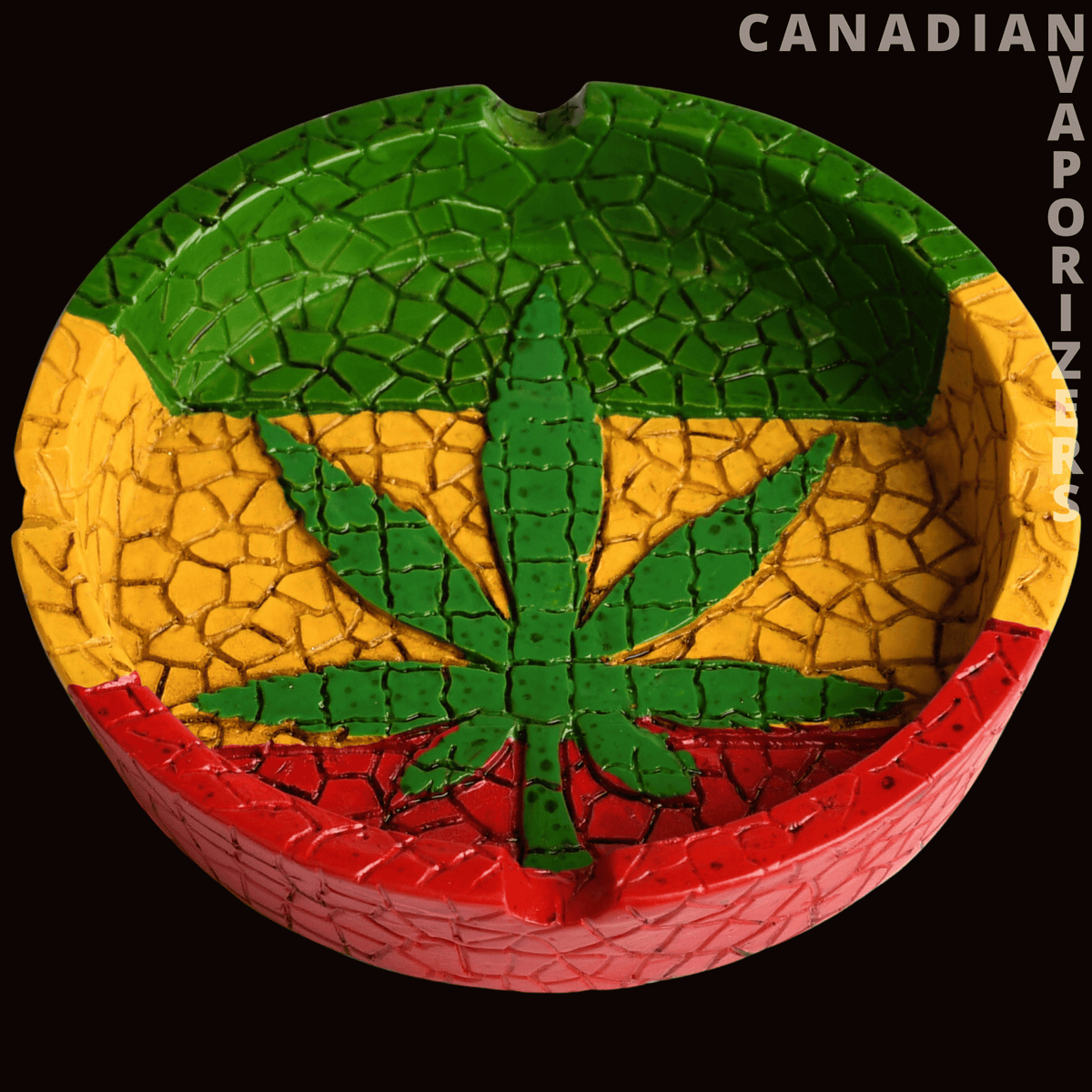 Multi Coloured Leaf Ashtray - Round multicolored leaf ashtray with a textured green, yellow, and red mosaic finish.