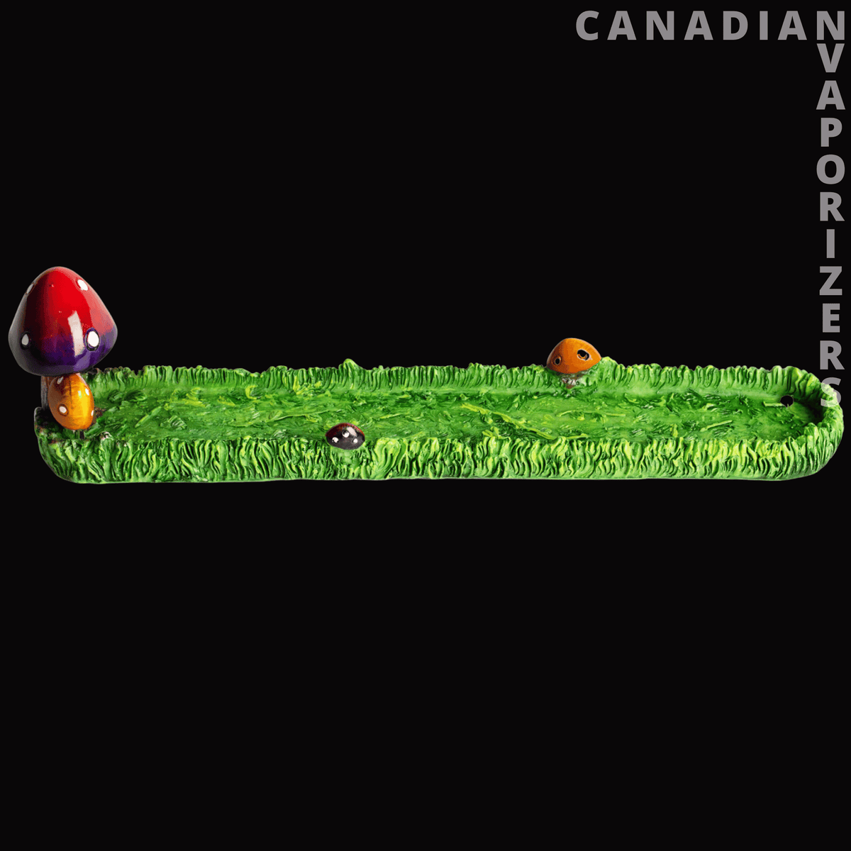 Mushroom Incense Holder - Green grass-shaped incense holder with a colorful mushroom at one end and tiny mushroom details.