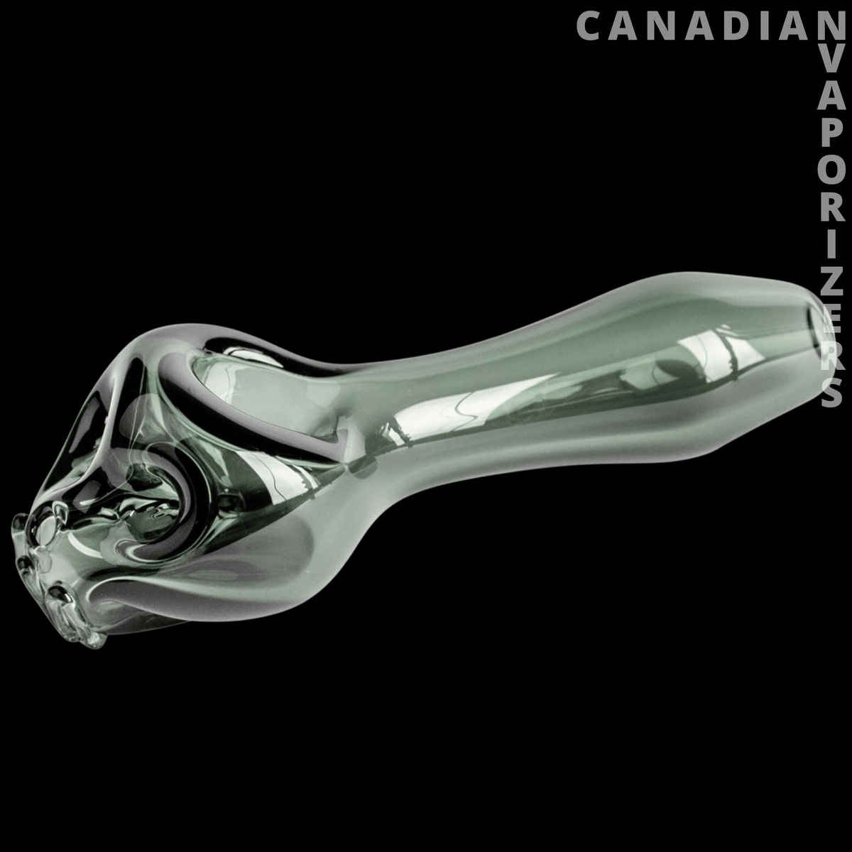 Red Eye Glass 4.25" Skull Hand Pipe - Clear smoke-gray glass skull hand pipe with sculpted skull detailing and a curved stem.