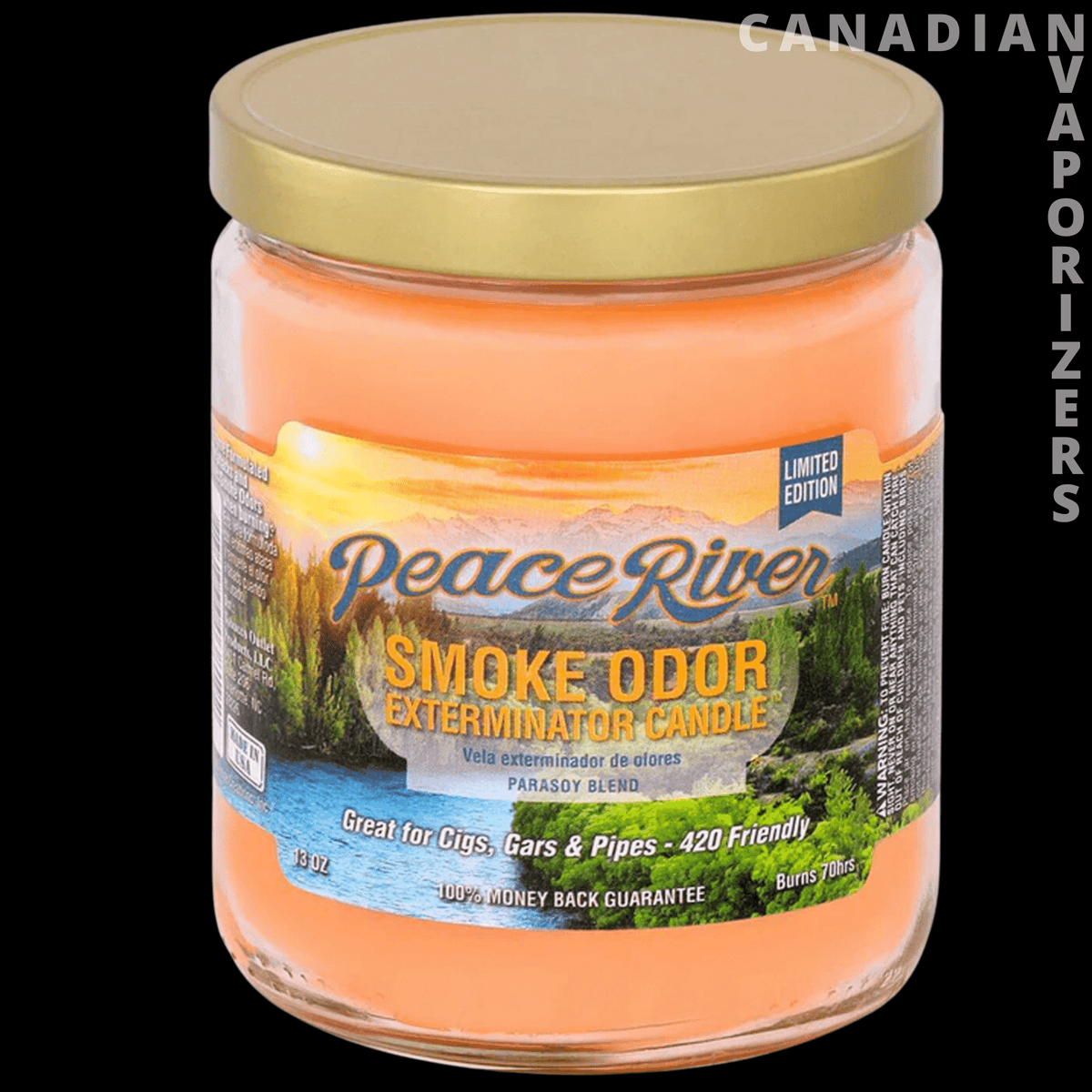 Smoke Odor Exterminator 13Oz Candle - Orange Smoke Odor Exterminator candle in a clear glass jar with a gold lid and colorful label.