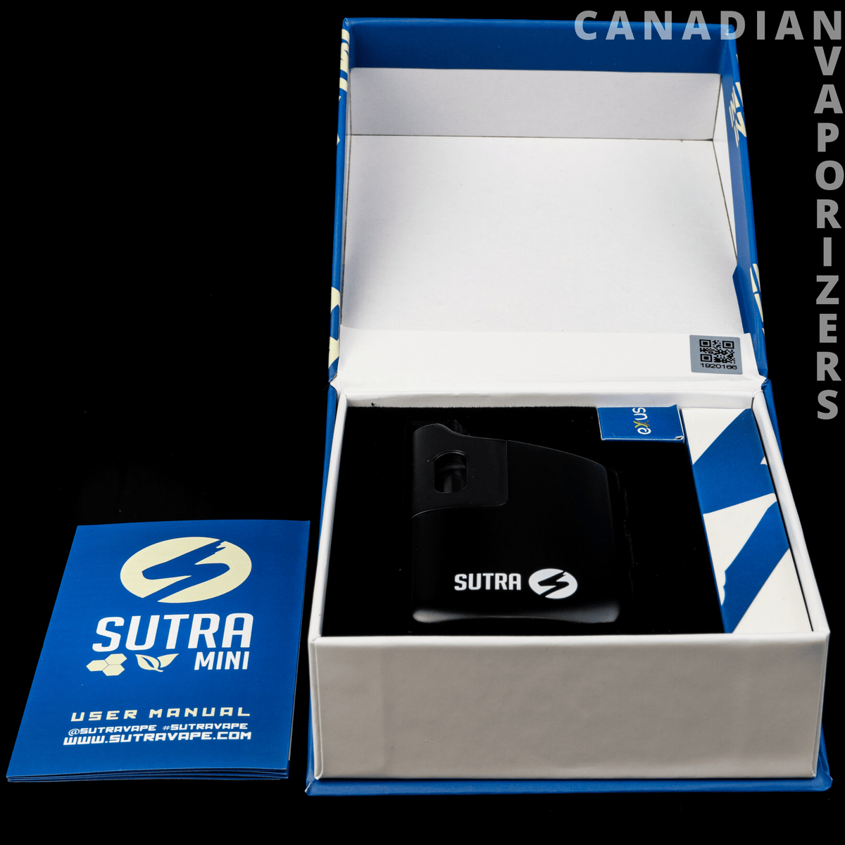 Sutra Mini Vape - Black Sutra Mini vape in an open blue-and-white display box beside its matching package lid.